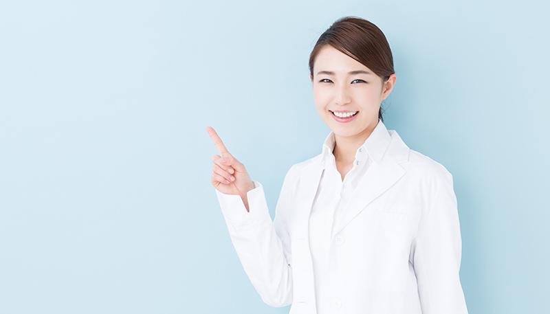 young asian doctor on blue background